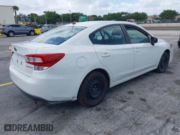 2018 Subaru Impreza with VIN 4S3GKAA68J3609404, listed as a IAAI auction lot 41954733 with 214,560 mi miles and . Bid and sale history available at DreamBid. Image 4.