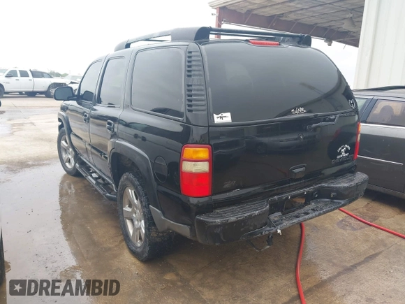 2002 Chevrolet Tahoe Z71 with VIN 1GNEK13Z92R278787, listed as a IAAI auction lot 41846808 with 200,981 mi miles. Bid and sale history available at carsss.com. Image 3.