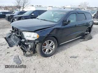 2012 Dodge Durango Crew with VIN 1C4RDJDG0CC337344, listed as a IAAI auction lot 41588370 with 162,339 mi miles. Bid and sale history available at carsss.com. Image 2.