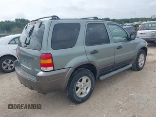 2006 Ford Escape XLT z VIN 1FMCU03126KB78152, wystawiony jako IAAI lot #42759568 z przebiegiem 132 048 mil mil oraz . Historia ofert i sprzedaży dostępna na DreamBid. Obrazek 4.