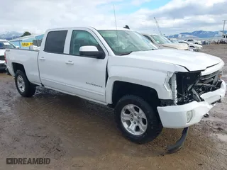 2016 Chevrolet Silverado 1500 LT with VIN 3GCUKREC4GG268073, listed as a IAAI auction lot 41201254 with 135,019 mi miles. Bid and sale history available at carsss.com. Image 1.
