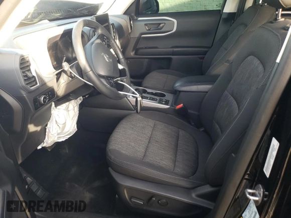 2023 Ford Bronco Sport Big Bend with VIN 3FMCR9B60PRD99510, listed as a Copart auction lot 87116324 with 29,261 mi miles and Salvage title. Bid and sale history available at DreamBid. Image 7.