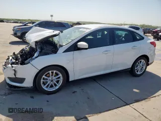 2018 Ford Focus SE z VIN 1FADP3F29JL225126, wystawiony jako Copart lot #52817265 z przebiegiem Nie podano mil oraz Szkody całkowita. Historia ofert i sprzedaży dostępna na DreamBid. Obrazek 1.