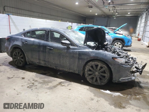 2021 Mazda 6 Carbon Edition with VIN JM1GL1WY4M1609858, listed as a Copart auction lot 41977695 with Not Provided miles and Salvage Title. Bid and sale history available at DreamBid. Image 4.