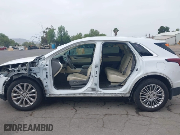 2017 Cadillac XT5 Premium Luxury FWD with VIN 1GYKNCRS4HZ128145, listed as a IAAI auction lot 42349980 with 99,100 mi miles and . Bid and sale history available at DreamBid. Image 15.