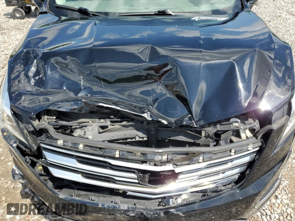 2017 Cadillac XT5 Luxury FWD с VIN 1GYKNBRS0HZ150007, выставлен на аукционе Copart как лот 54745505 с пробегом 37 271 миль миль и Списание • Salvage title. История ставок и продаж доступна на DreamBid. Изображение 12.
