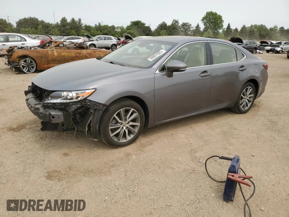 2016 Lexus ES 300h with VIN JTHBW1GG5G2103282, listed as a Copart auction lot 58801825 with 81,917 mi miles and Salvage title. Bid and sale history available at DreamBid. Image 1.