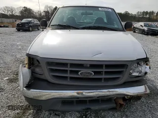 2003 Ford F-150 XL z VIN 1FTRF18W53NB45997, wystawiony jako Copart lot #42451525 z przebiegiem 149 166 mil mil oraz Szkoda całkowita • Salvage title. Historia ofert i sprzedaży dostępna na DreamBid. Obrazek 5.