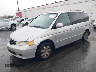 2004 Honda Odyssey EX-L with VIN 5FNRL18934B016420, listed as a IAAI auction lot 41473237 with 188,659 mi miles and . Bid and sale history available at DreamBid. Image 17.