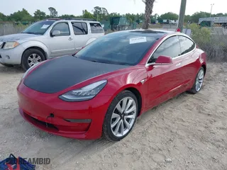 2018 Tesla Model 3 Long Range Battery with VIN 5YJ3E1EA4JF053227, listed as a IAAI auction lot 41854908 with 84,293 mi miles. Bid and sale history available at carsss.com. Image 18.
