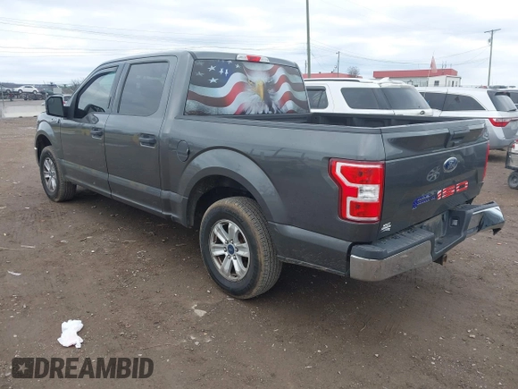2019 Ford F-150 XL with VIN 1FTEW1CBXKFC64236, listed as a IAAI auction lot 41531279 with 102,965 mi miles and . Bid and sale history available at carsss.com. Image 3.