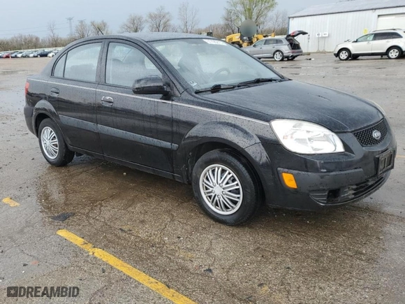 2009 Kia Rio with VIN KNADE223196446784, listed as a Copart auction lot 51796215 with 115442 miles and Clean Title. Bid and sale history available at carsss.com. Image 4.