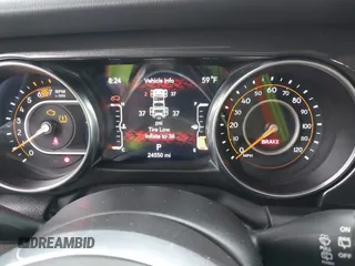 2023 Jeep Wrangler Sahara with VIN 1C4HJXEG5PW581632, listed as a IAAI auction lot 42462622 with 24,550 mi miles and . Bid and sale history available at DreamBid. Image 7.