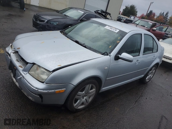2004 Volkswagen Jetta GL z VIN 3VWRK69M54M030184, wystawiony jako Copart lot #77764124 z przebiegiem 97 634 mil mil oraz Szkoda całkowita • Salvage title. Historia ofert i sprzedaży dostępna na DreamBid. Obrazek 1.