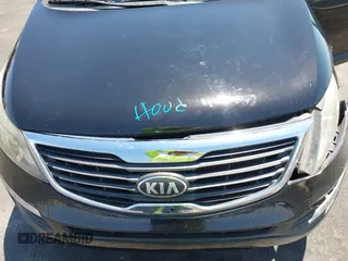 2013 Kia Sportage LX with VIN KNDPBCA25D7449584, listed as a IAAI auction lot 42489414 with 100,993 mi miles and . Bid and sale history available at DreamBid. Image 10.