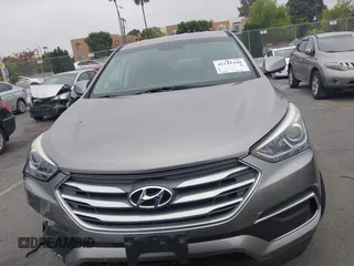 2018 Hyundai Santa Fe 2.4L with VIN 5XYZT3LB7JG569517, listed as a IAAI auction lot 42141100 with 57,854 mi miles and . Bid and sale history available at DreamBid. Image 13.