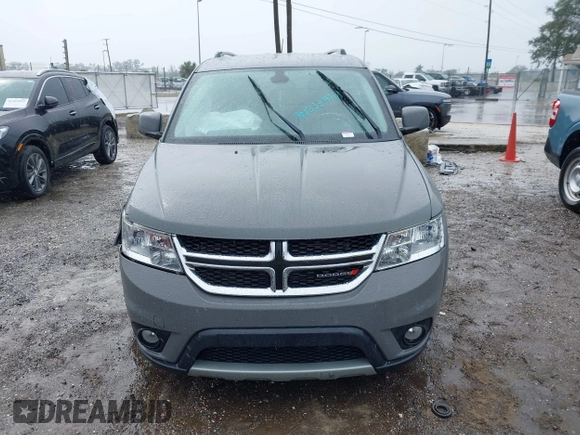 2019 Dodge Journey SE with VIN 3C4PDCBB2KT804440, listed as a IAAI auction lot 41333876 with 72,209 mi miles and . Bid and sale history available at DreamBid. Image 12.