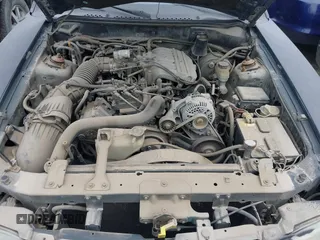 1997 Ford Mustang with VIN 1FALP4043VF158166, listed as a IAAI auction lot 39369761 with 124,992 mi miles. Bid and sale history available at carsss.com. Image 10.