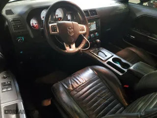 2013 Dodge Challenger SXT with VIN 2C3CDYAG5DH725000, listed as a Copart auction lot 82157004 with 188,278 mi miles and Salvage Title. Bid and sale history available at carsss.com. Image 8.