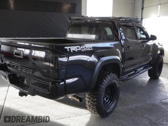 2021 Toyota Tacoma SR z VIN 3TMCZ5AN3MM420851, wystawiony jako Copart lot #55668255 z przebiegiem 61 329 mil mil oraz Szkoda całkowita • Salvage title. Historia ofert i sprzedaży dostępna na DreamBid. Obrazek 3.