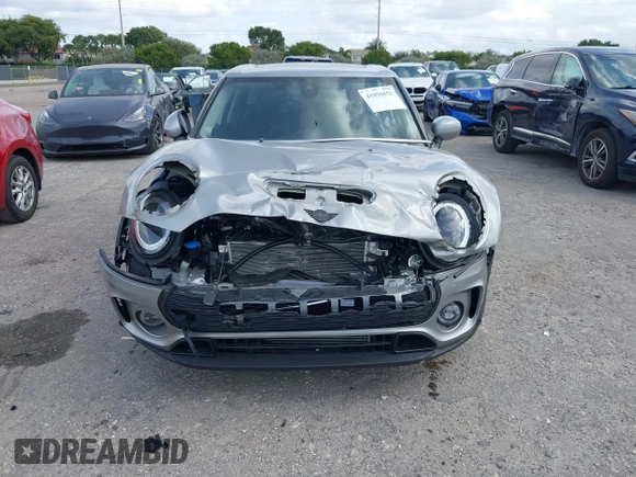 2023 MINI Clubman Cooper S with VIN WMWXJ1C03P2U08484, listed as a IAAI auction lot 41056651 with 12,948 mi miles. Bid and sale history available at carsss.com. Image 6.