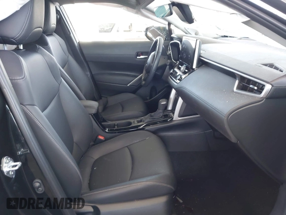 2023 Toyota Corolla Cross XLE with VIN 7MUDAAAG8PV072030, listed as a IAAI auction lot 42397573 with 6,584 mi miles and . Bid and sale history available at DreamBid. Image 5.