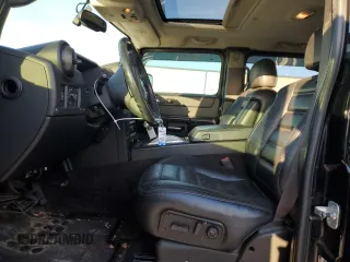 2005 Hummer H2 SUT with VIN 5GRGN22U85H109003, listed as a Copart auction lot 76557734 with 115,249 mi miles and Salvage Title. Bid and sale history available at carsss.com. Image 7.