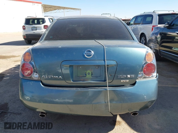 2002 Nissan Altima SE with VIN 1N4BL11D72C700998, listed as a IAAI auction lot 41369017 with 117,148 mi miles. Bid and sale history available at carsss.com. Image 16.