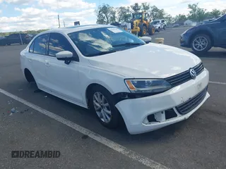 2012 Volkswagen Jetta SE z VIN 3VWDX7AJ7CM362001, wystawiony jako IAAI lot #42209146 z przebiegiem 200 566 mil mil oraz . Historia ofert i sprzedaży dostępna na DreamBid. Obrazek 1.