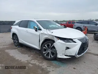2018 Lexus RX 350L Premium z VIN JTJDZKCAXJ2010125, wystawiony jako IAAI lot #41899420 z przebiegiem 113 995 mil mil oraz . Historia ofert i sprzedaży dostępna na DreamBid. Obrazek 1.