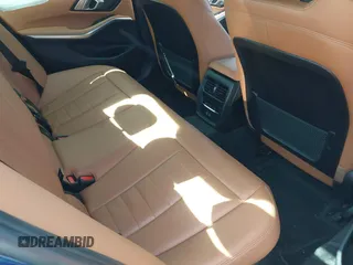 2021 BMW 3 Series 330i z VIN 3MW5R1J00M8C08985, wystawiony jako IAAI lot #41977683 z przebiegiem 34 640 mil mil oraz . Historia ofert i sprzedaży dostępna na DreamBid. Obrazek 8.