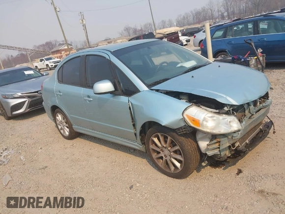 2009 Suzuki SX4 Sport FWD z VIN JS2YC414996201530, wystawiony jako IAAI lot #41476333 z przebiegiem 148 263 mil mil oraz . Historia ofert i sprzedaży dostępna na DreamBid. Obrazek 1.