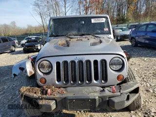 2013 Jeep Wrangler Unlimited Rubicon 10th Anniversary z VIN 1C4HJWFG3DL692993, wystawiony jako Copart lot #78599224 z przebiegiem 135 942 mil mil oraz Szkoda całkowita • Salvage title. Historia ofert i sprzedaży dostępna na DreamBid. Obrazek 5.