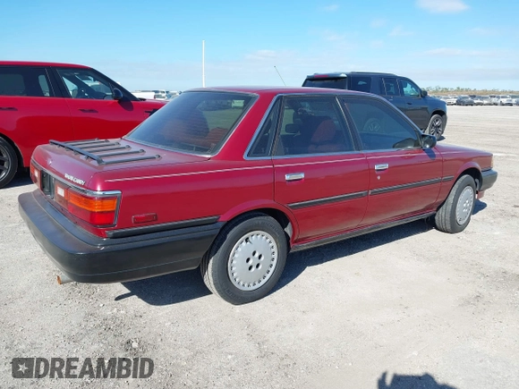 1989 Toyota Camry DLX с VIN 4T1SV21E9KU059104, выставлен на аукционе IAAI как лот 41014925 с пробегом 312 844 миль миль и . История ставок и продаж доступна на DreamBid. Изображение 4.
