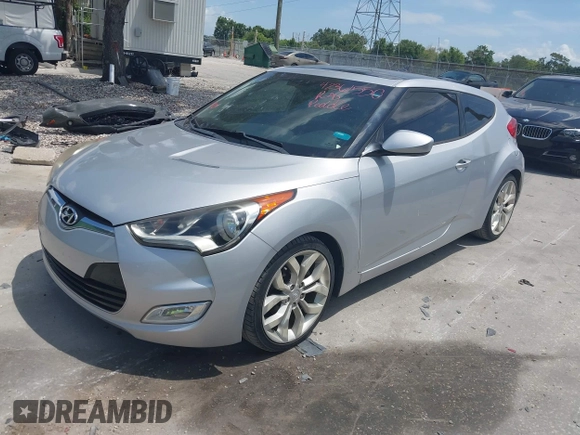 2012 Hyundai Veloster w/Gray Int with VIN KMHTC6ADXCU028115, listed as a IAAI auction lot 42361550 with 118,920 mi miles and . Bid and sale history available at DreamBid. Image 2.