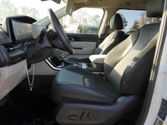 2023 Kia Carnival SX Prestige with VIN KNDNE5H33P6224499, listed as a Copart auction lot 77567844 with 29,661 mi miles and Salvage Title. Bid and sale history available at carsss.com. Image 7.