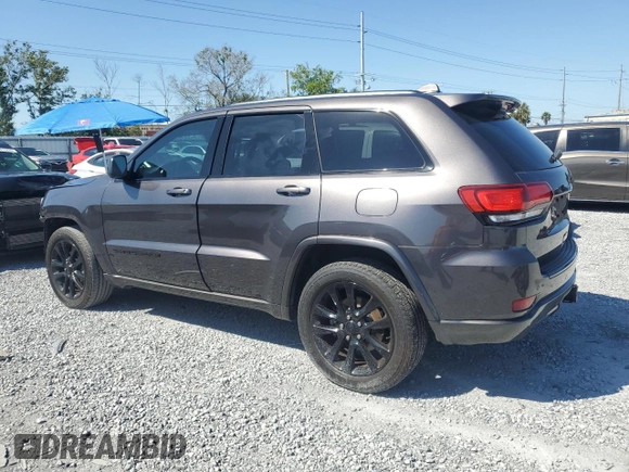 2017 Jeep Grand Cherokee 75th Anniversary with VIN 1C4RJEAG4HC700191, listed as a Copart auction lot 52520655 with 130,828 mi miles and Salvage title. Bid and sale history available at DreamBid. Image 2.