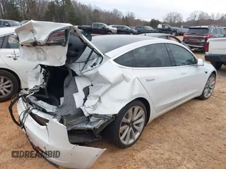 2020 Tesla Model 3 Standard Range Plus with VIN 5YJ3E1EA1LF738062, listed as a IAAI auction lot 41747581 with 41,897 mi miles. Bid and sale history available at carsss.com. Image 4.