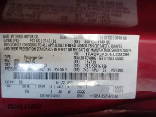 2014 Ford Focus SE with VIN 1FADP3K20EL325286, listed as a IAAI auction lot 42076013 with 119,271 mi miles. Bid and sale history available at carsss.com. Image 9.
