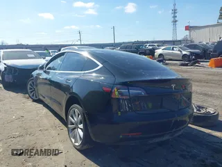2020 Tesla Model 3 Standard Range Plus with VIN 5YJ3E1EA0LF660759, listed as a IAAI auction lot 41505250 with 63,322 mi miles and . Bid and sale history available at DreamBid. Image 3.