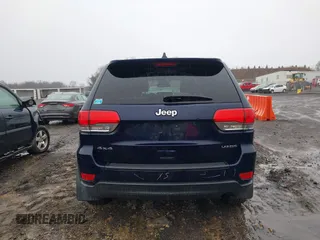 2014 Jeep Grand Cherokee Laredo with VIN 1C4RJFAGXEC109865, listed as a IAAI auction lot 41971070 with 129,460 mi miles. Bid and sale history available at carsss.com. Image 17.