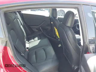 2021 Tesla Model 3 Long Range with VIN 5YJ3E1EB4MF936743, listed as a IAAI auction lot 42154322 with 46,983 mi miles and . Bid and sale history available at DreamBid. Image 8.