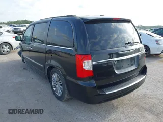 2013 Chrysler Town & Country Touring L with VIN 2C4RC1CG9DR778449, listed as a IAAI auction lot 42045779 with 217,776 mi miles and . Bid and sale history available at DreamBid. Image 3.