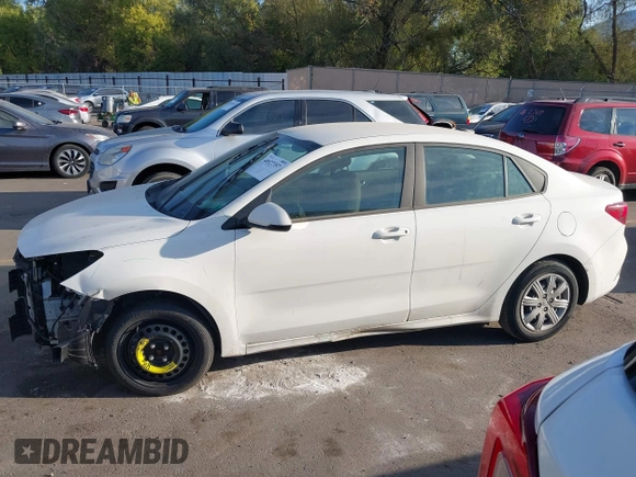 2022 Kia Rio S with VIN 3KPA24AD4NE498600, listed as a IAAI auction lot 40527357 with 59,614 mi miles and . Bid and sale history available at carsss.com. Image 14.