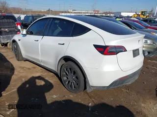 2021 Tesla Model Y Long Range with VIN 5YJYGDEE5MF203175, listed as a IAAI auction lot 41758334 with 63,387 mi miles and . Bid and sale history available at DreamBid. Image 3.