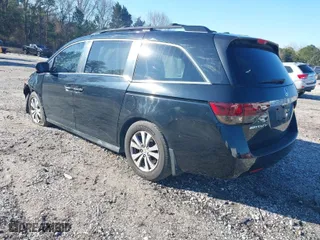 2016 Honda Odyssey EX-L with VIN 5FNRL5H63GB050617, listed as a IAAI auction lot 41678167 with 128,000 mi miles. Bid and sale history available at carsss.com. Image 3.