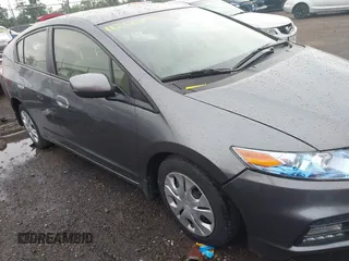 2014 Honda Insight LX with VIN JHMZE2H54ES000081, listed as a IAAI auction lot 42622054 with 30,097 mi miles and . Bid and sale history available at DreamBid. Image 1.