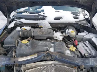 2004 Dodge Dakota SLT with VIN 1D7HG42N74S665198, listed as a IAAI auction lot 41477799 with 213,175 mi miles. Bid and sale history available at carsss.com. Image 10.