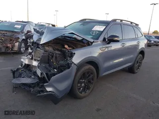 2022 Kia Sorento X-Line S with VIN 5XYRLDLC2NG127393, listed as a IAAI auction lot 41236501 with 50,821 mi miles. Bid and sale history available at carsss.com. Image 2.