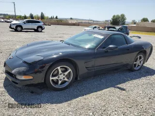 2004 Chevrolet Corvette with VIN 1G1YY22G145116083, listed as a Copart auction lot 52054735 with 158,087 mi miles and Salvage Title. Bid and sale history available at carsss.com. Image 1.